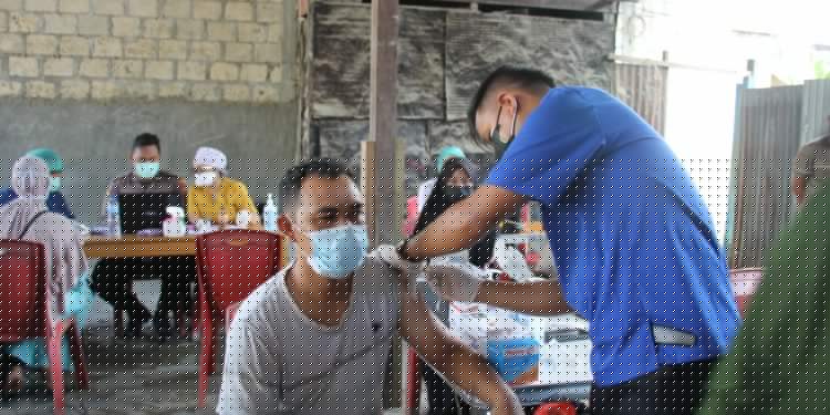 Polres Jayapura Kerjasama HKJM  Lakukan Vaksinasi Massal bagi Warga BTN Matoa Sentani