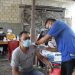 Polres Jayapura Kerjasama HKJM  Lakukan Vaksinasi Massal bagi Warga BTN Matoa Sentani