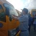 Jasa Raharja Cabang Papua dan Papua Barat Pasang Stiker SWDKLLJ pada Bus PON XX