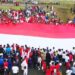 Peringati HUT RI ke 78, Masyarakat Puncak Jaya Bentangkan Bendera Merah Putih Raksasa
